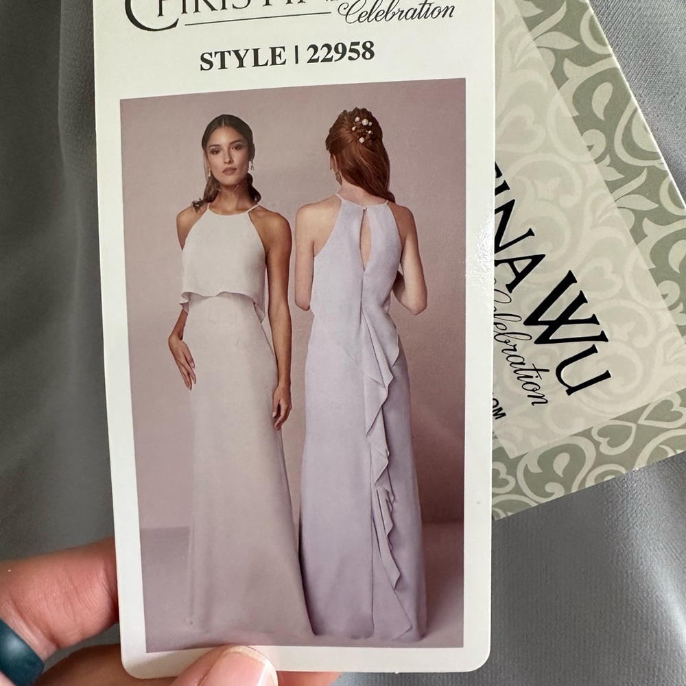 ⭐️Never Worn⭐️ Christina Wu Celebration dress. Size 16. Platinum color.